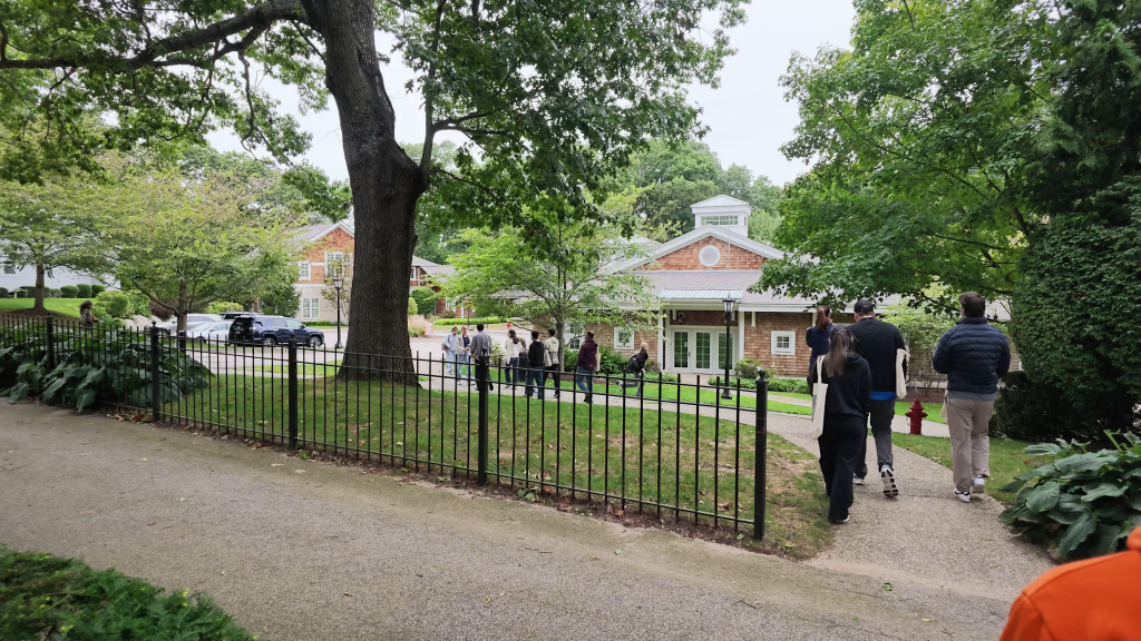 GESP partners on a campus visit, walking the path between school buildings